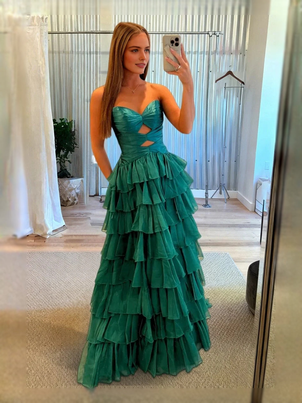 Teal sweetheart corset prom dress with cut-out bodice, tiered ruffle skirt and slit