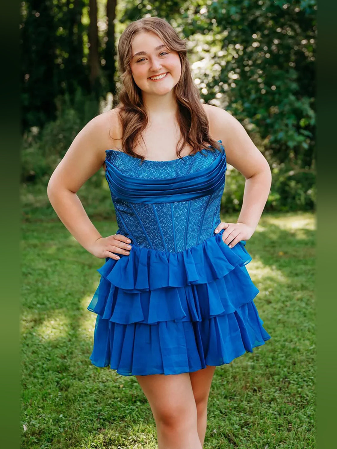 Royal blue strapless chiffon homecoming dress with ruched sparkly bodice and ruffle tiers