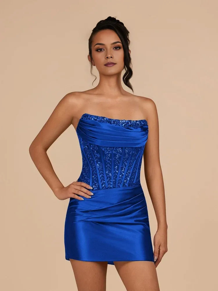 Royal blue strapless ruched satin mini dress with draped waist and corset embellishments
