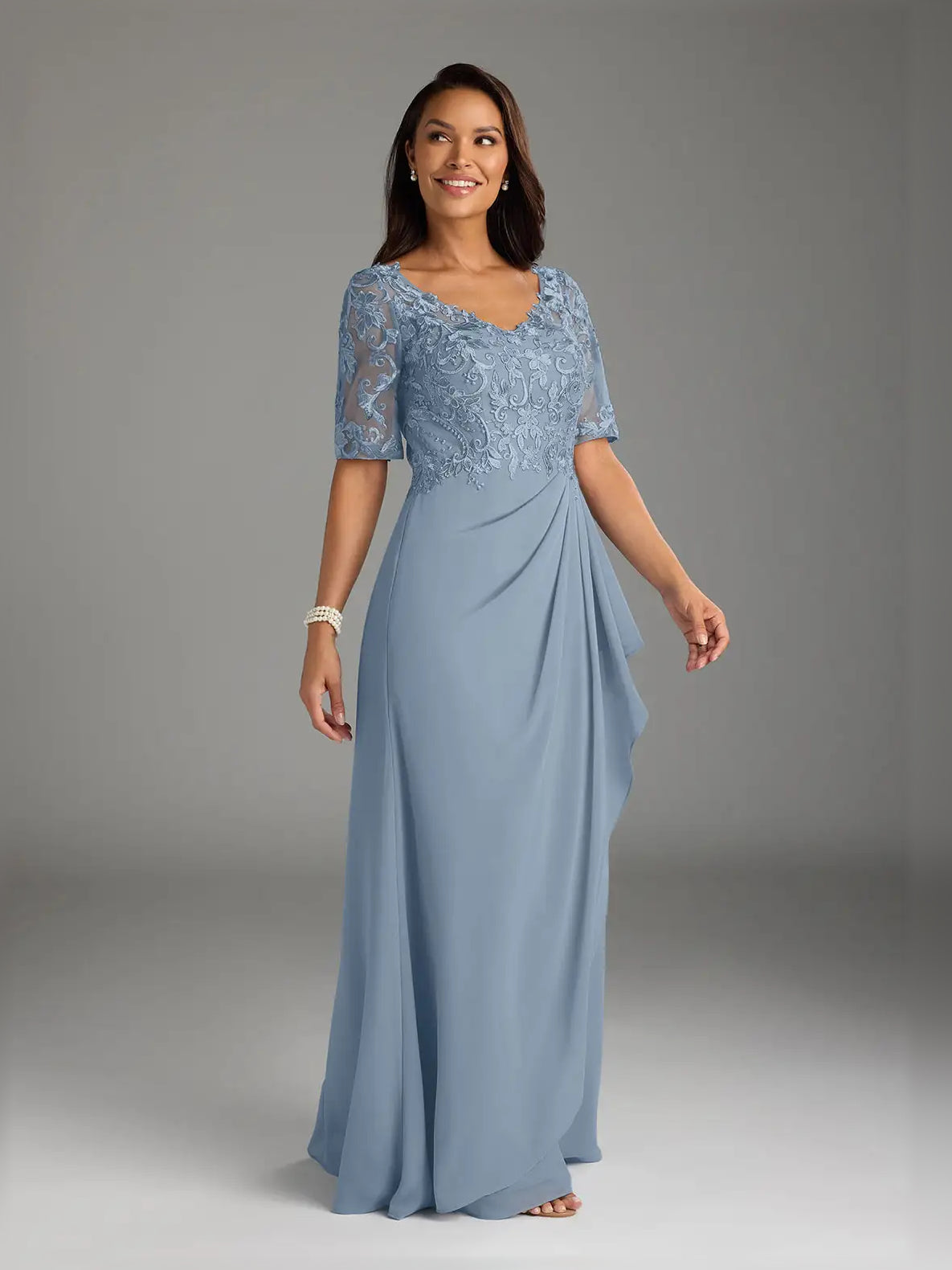 Dusty blue embroidered V-neck A-line maxi dress with short sleeves and ruffled detail