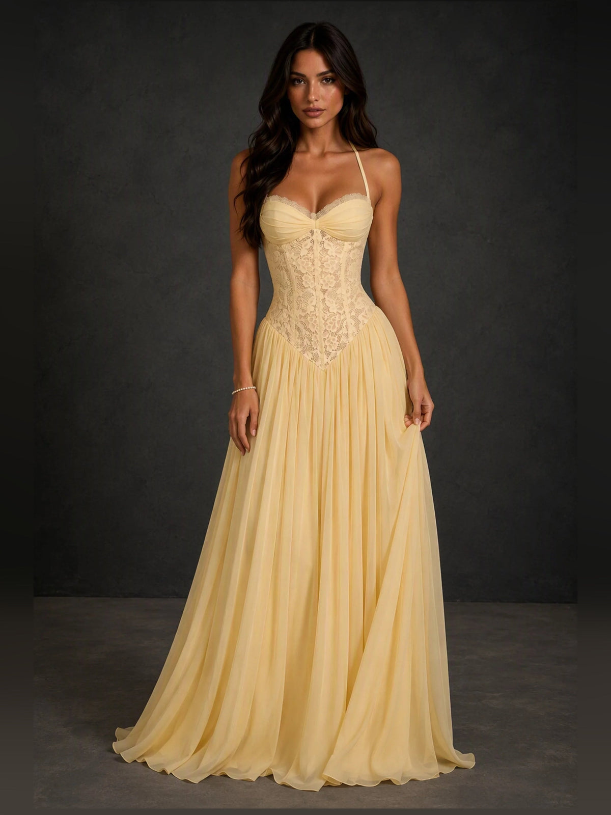 Light yellow sweetheart A-line prom dress with lace bodice and pleated floor-length skirt