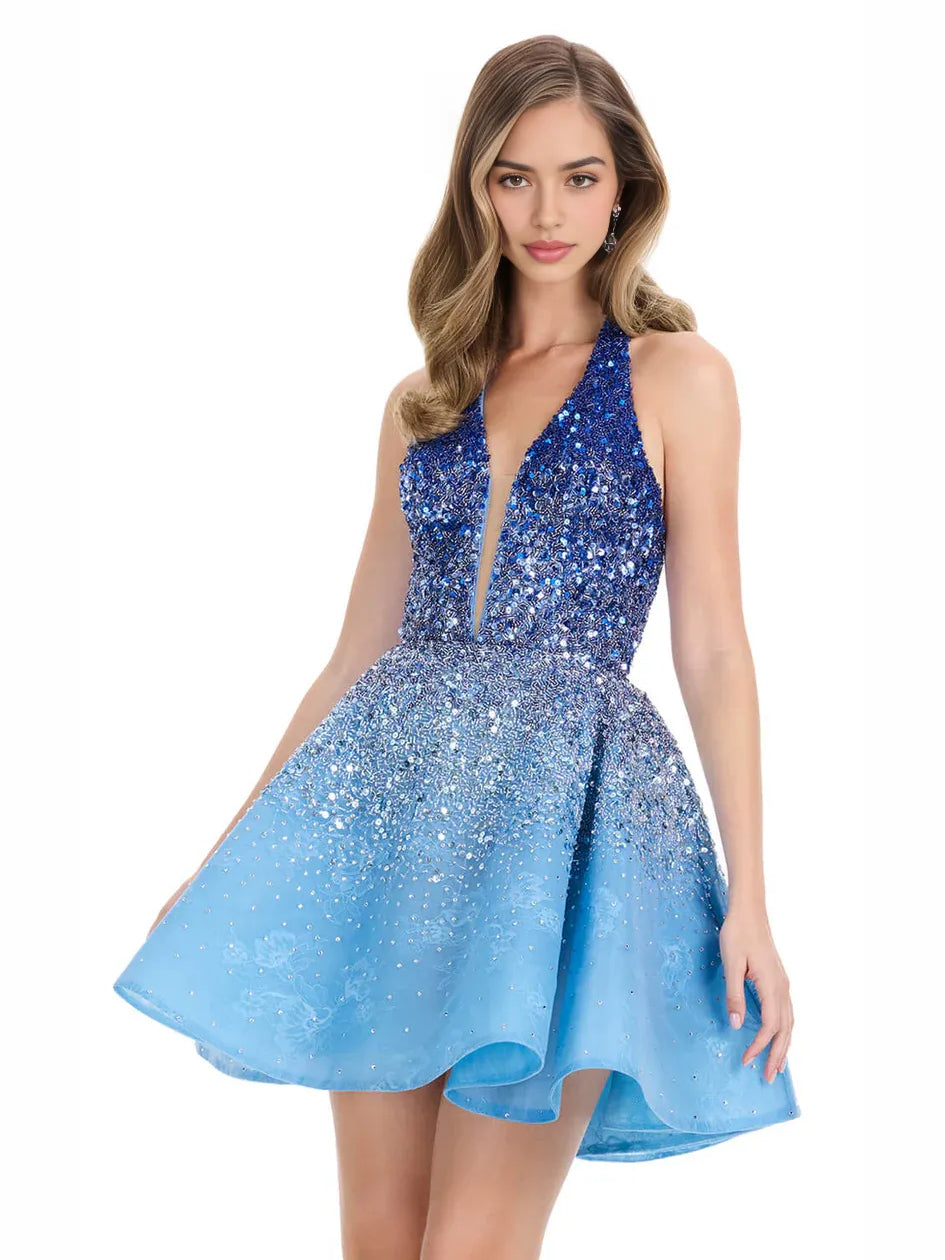 Blue halter-neck sequin A-line mini dress with V keyhole and layered skirt hem.