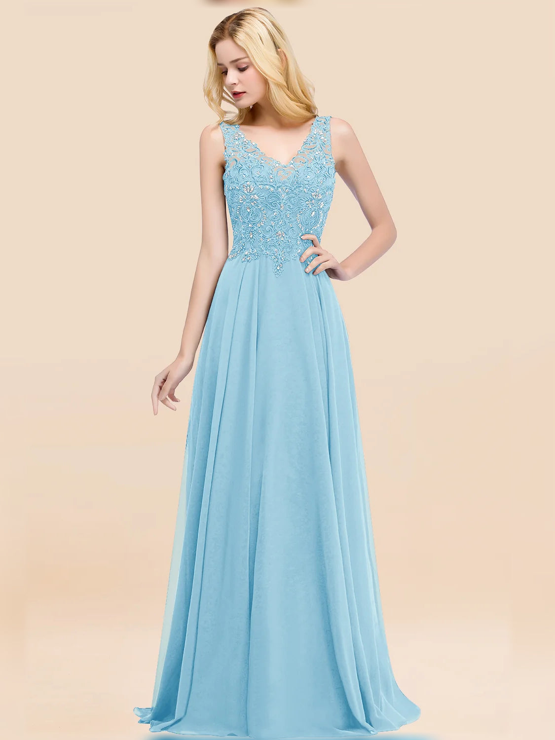 Light blue sleeveless V-neck lace bodice chiffon A-line gown with full flowing skirt.