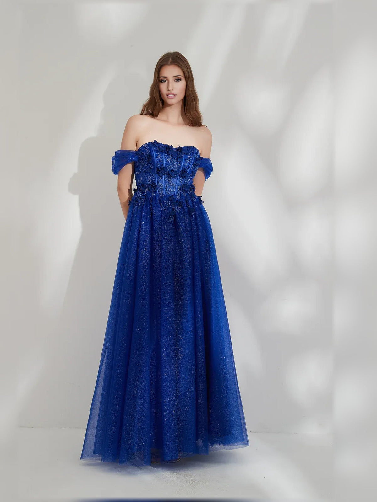 Dark blue off-shoulder floor-length formal dress with gathered bodice and ruffled sleeves
