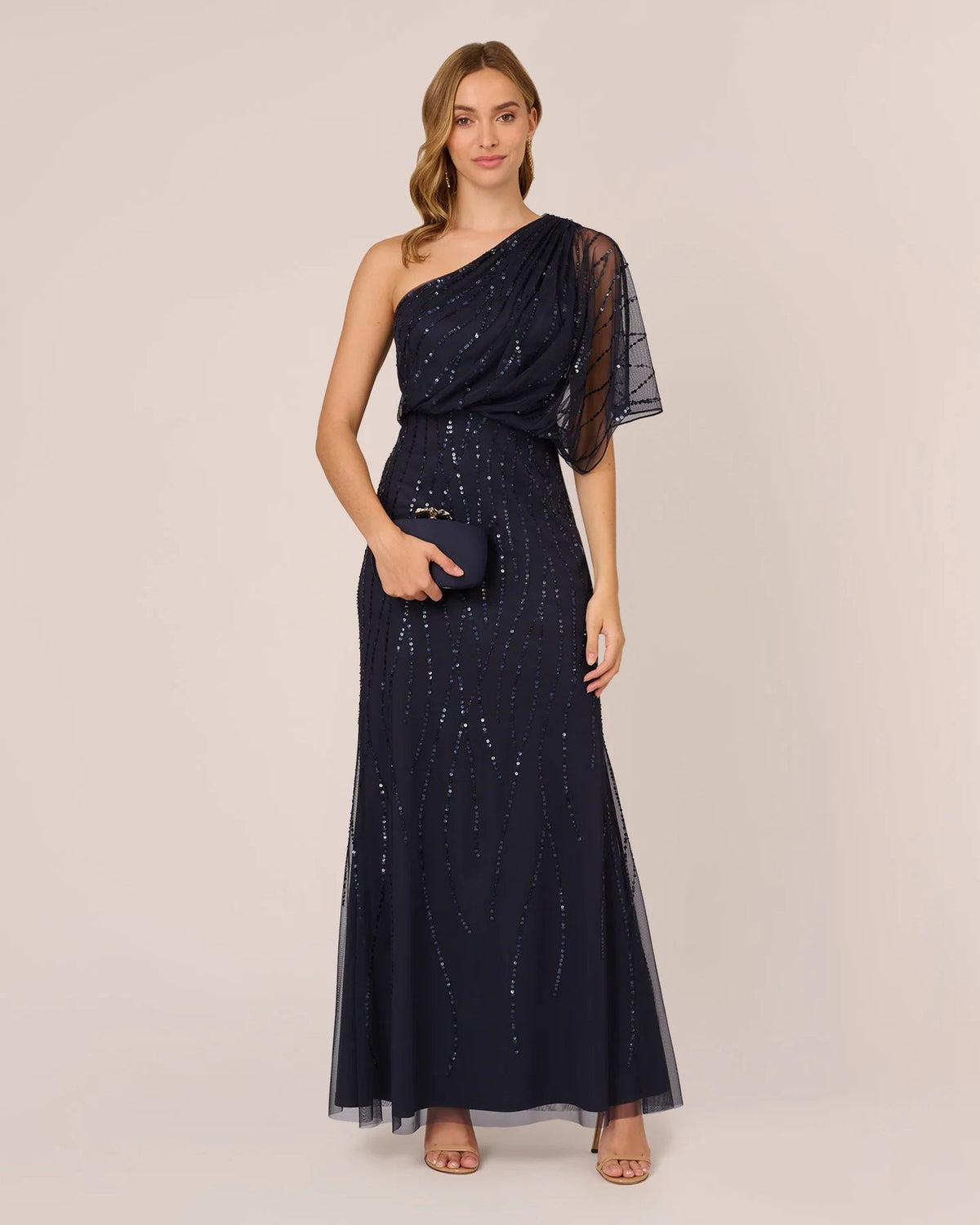 Dusty navy one-shoulder draped maxi dress with glittering sequin detail and tulle overlay sleeve