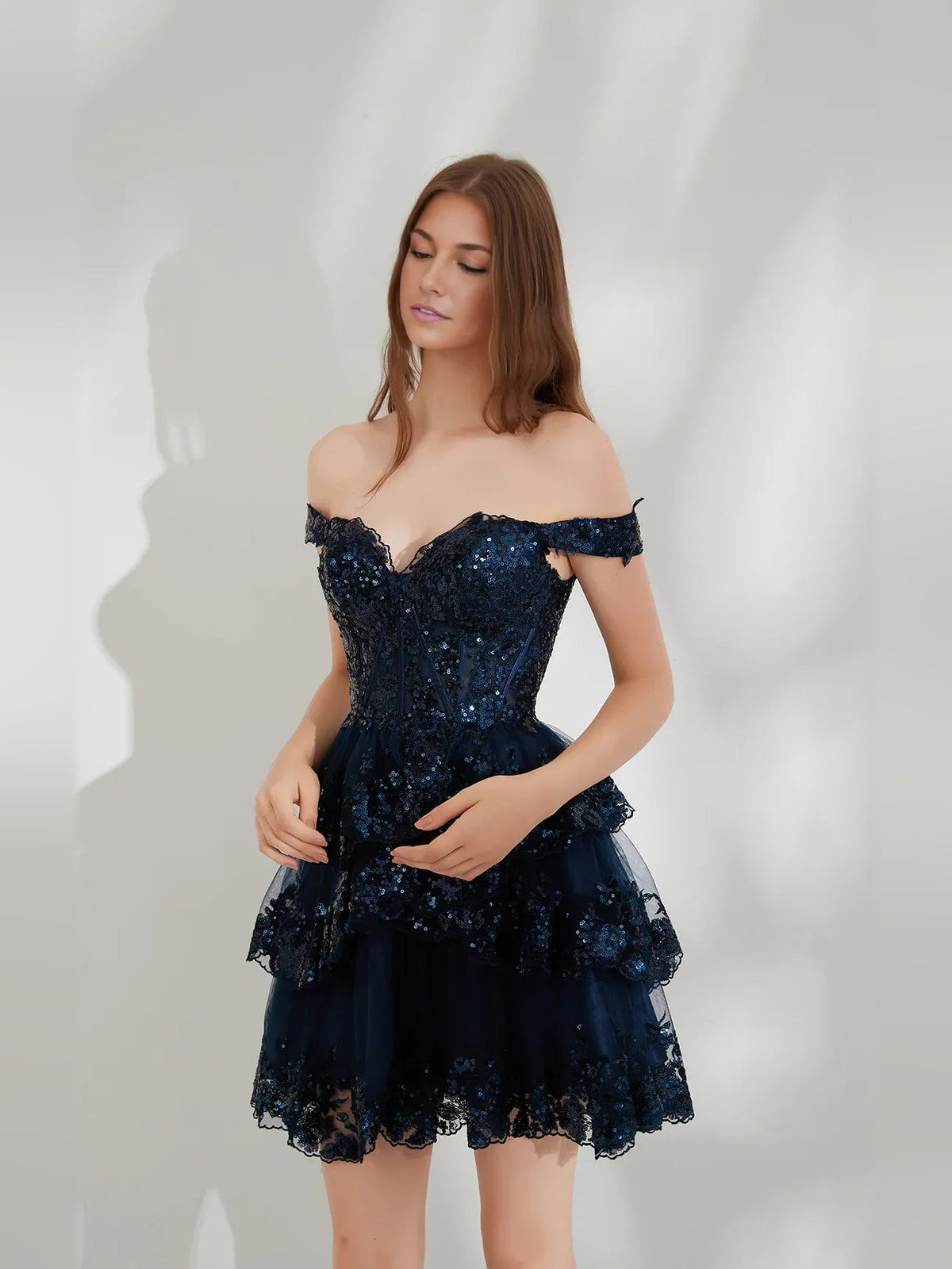 Navy blue off-shoulder sweetheart corset mini dress with sequined bodice and tulle skirt
