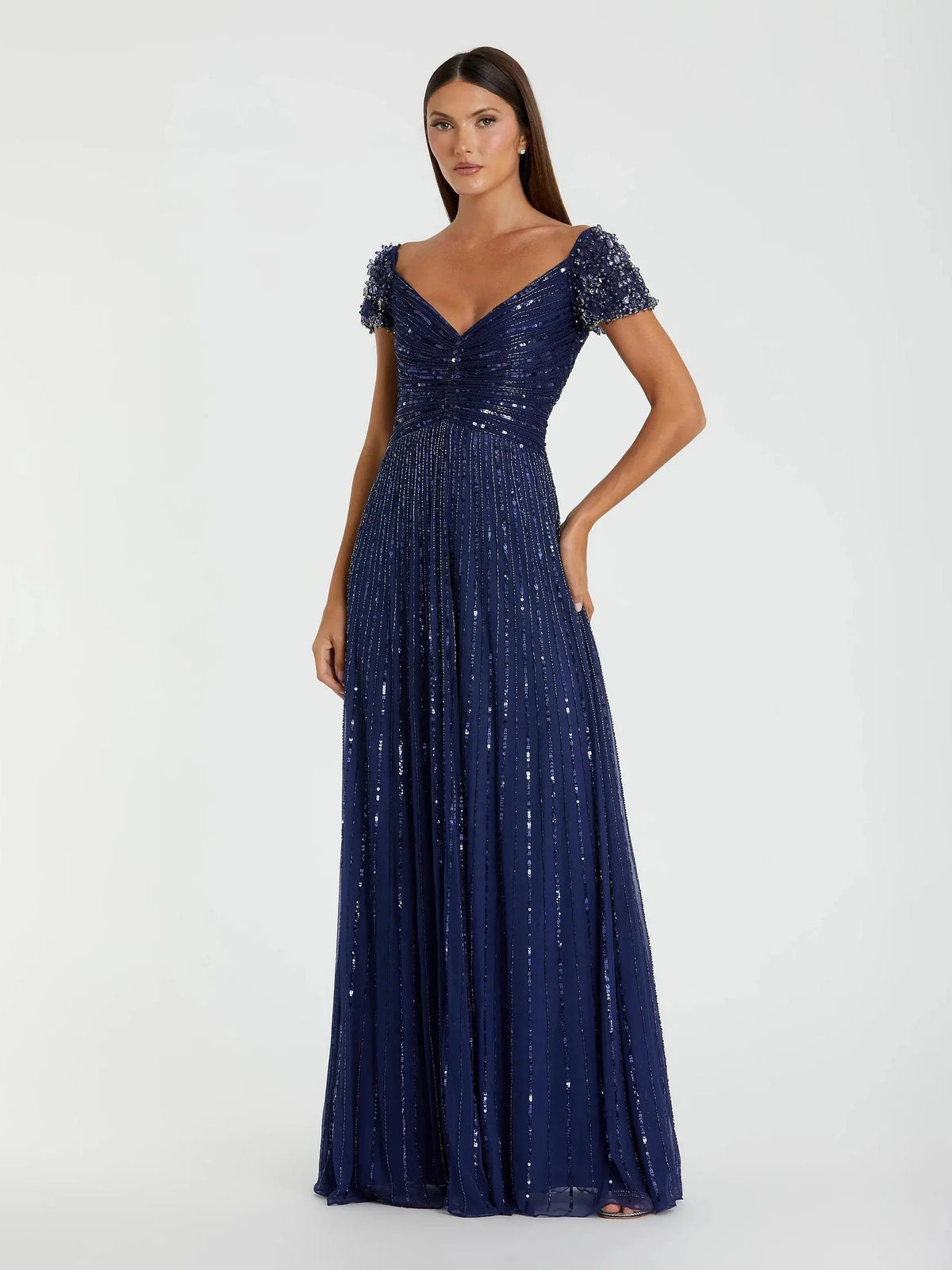 Navy blue beaded formal dress with sweetheart neckline, ruching, short sleeves