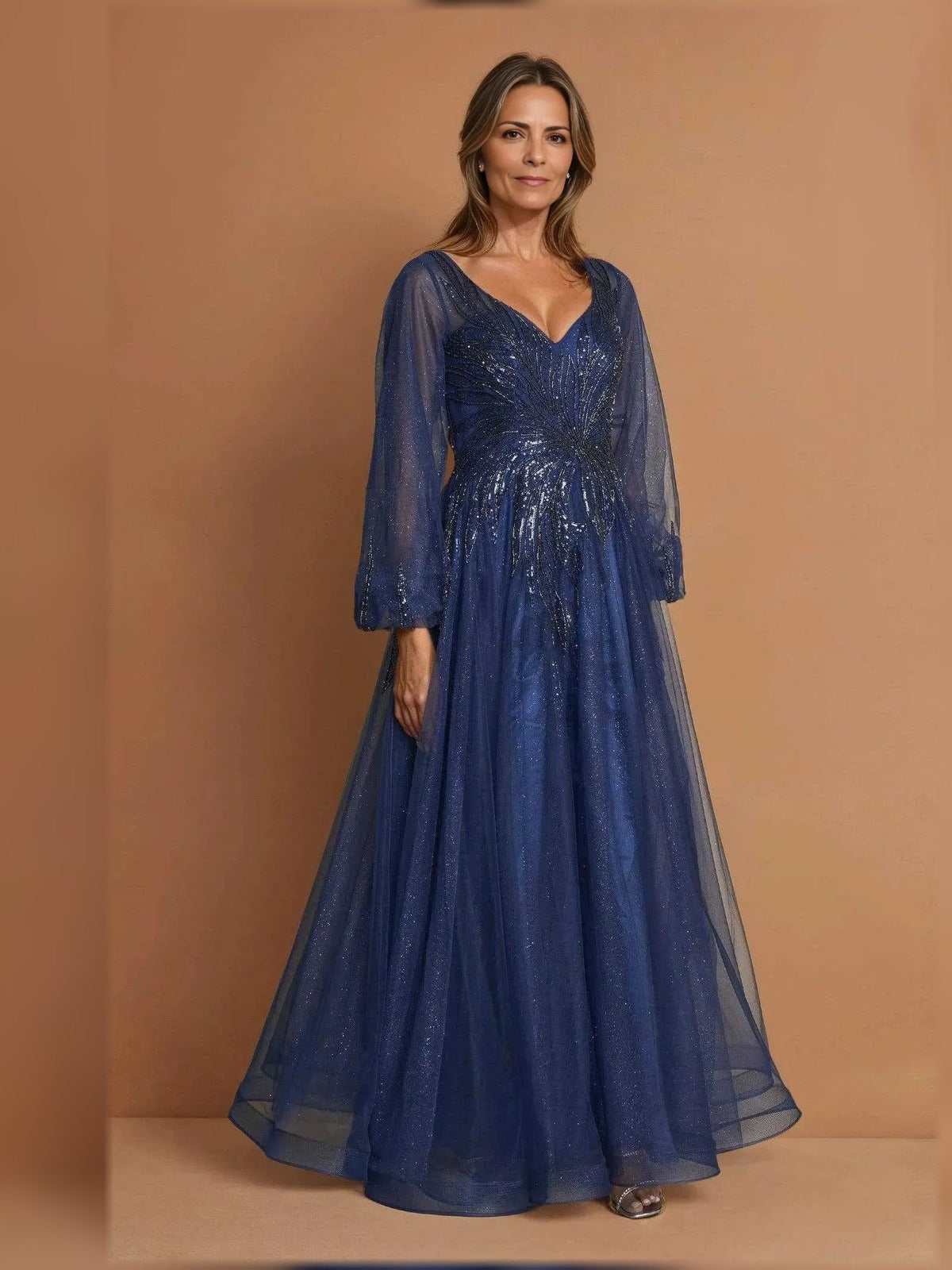 Navy blue draped beaded maxi dress with V-neck A-line silhouette and tulle skirt