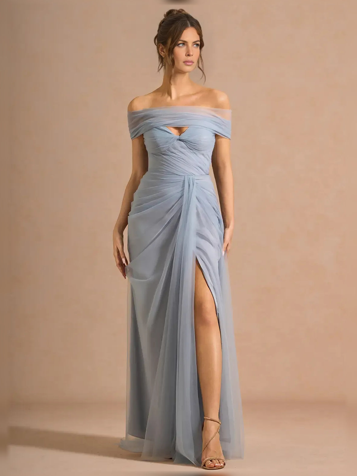 Off-shoulder formal dress in powder blue with ruched bodice and side drape