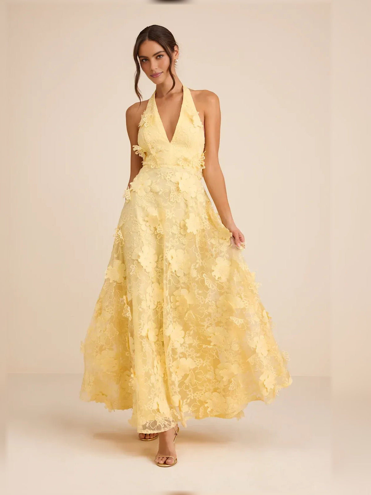Yellow halter neck maxi formal dress with floral lace appliques and tiered skirt