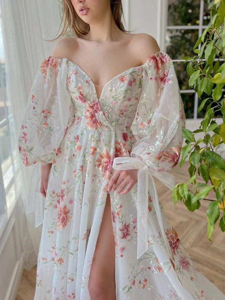 Floral tulle prom dress with sweetheart bodice, gathered skirt, off-shoulder puff sleeves.