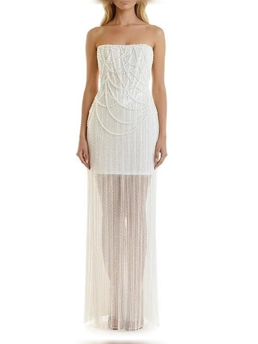 Ivory strapless corset-style formal dress with beaded swirl bodice and layered fringe