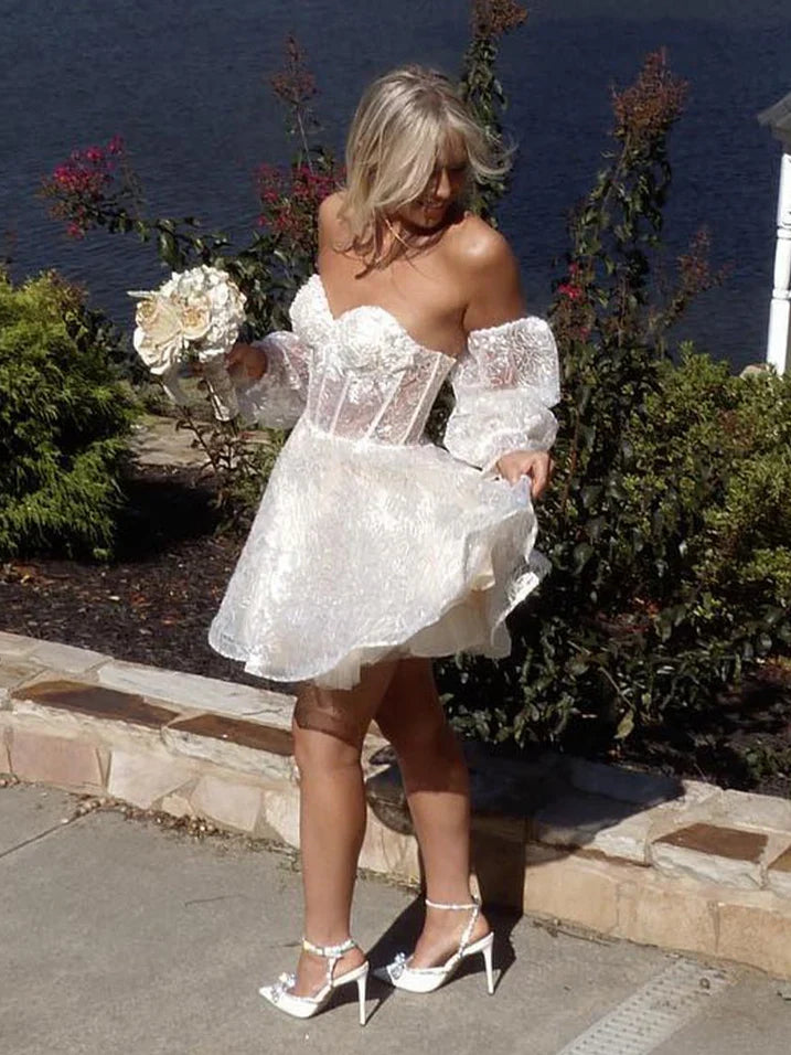 Ivory mini homecoming dress with corset bodice, sweetheart neckline, floral lace applique