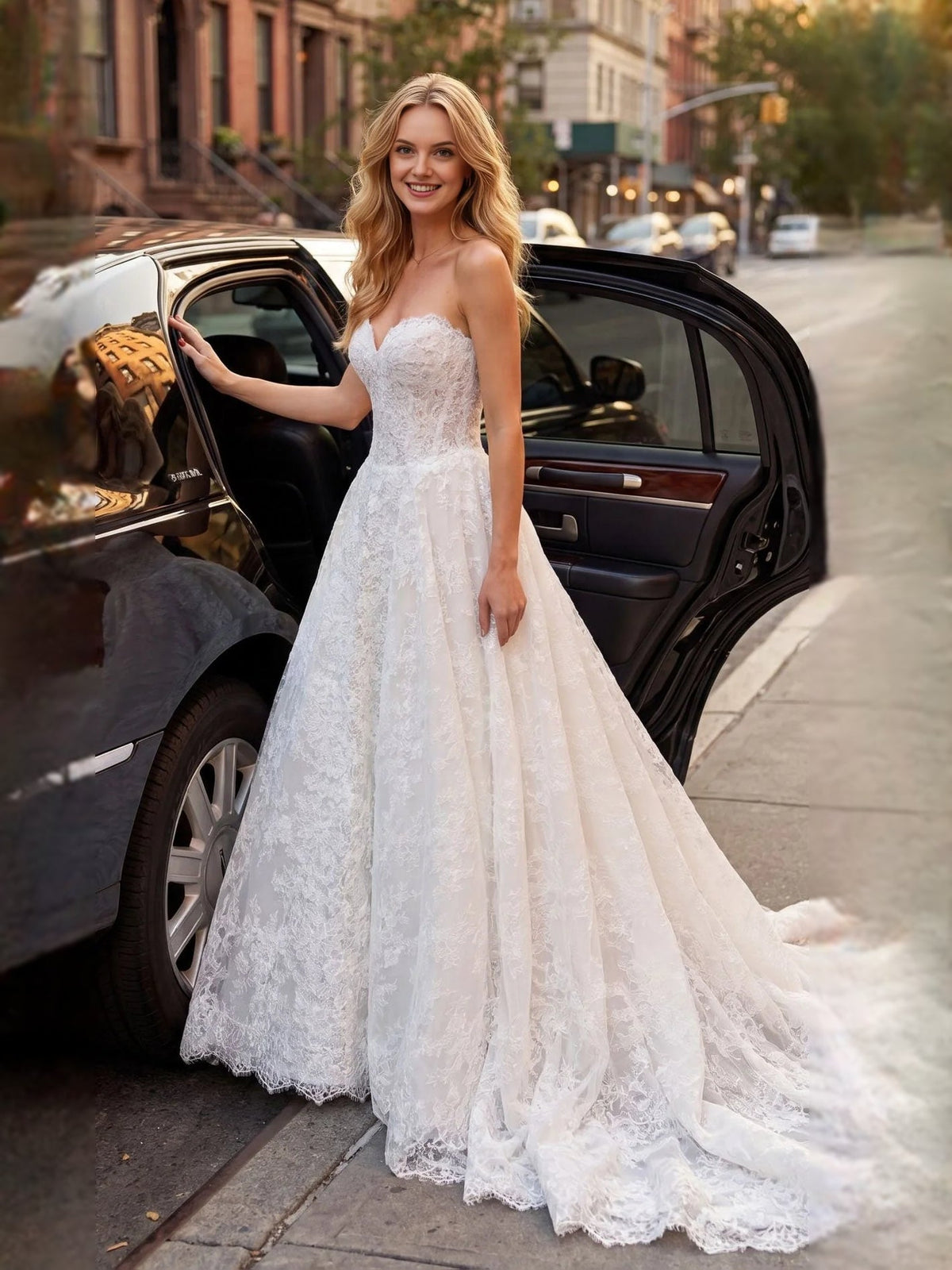 Ivory tulle A-line wedding dress with sweetheart bodice and airy lace train
