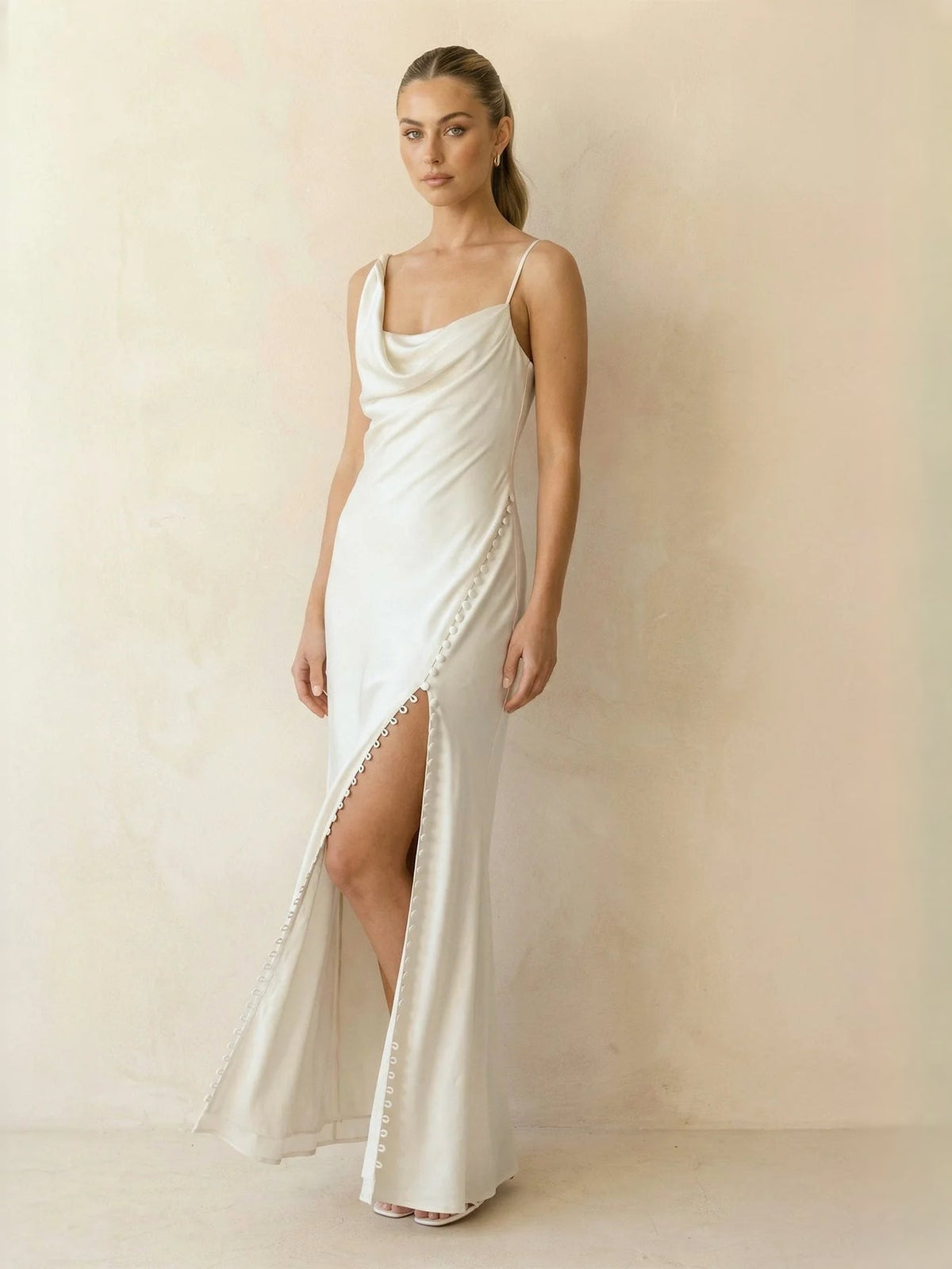 Ivory satin mermaid maxi dress with draped corset, cowl neckline, and front slit