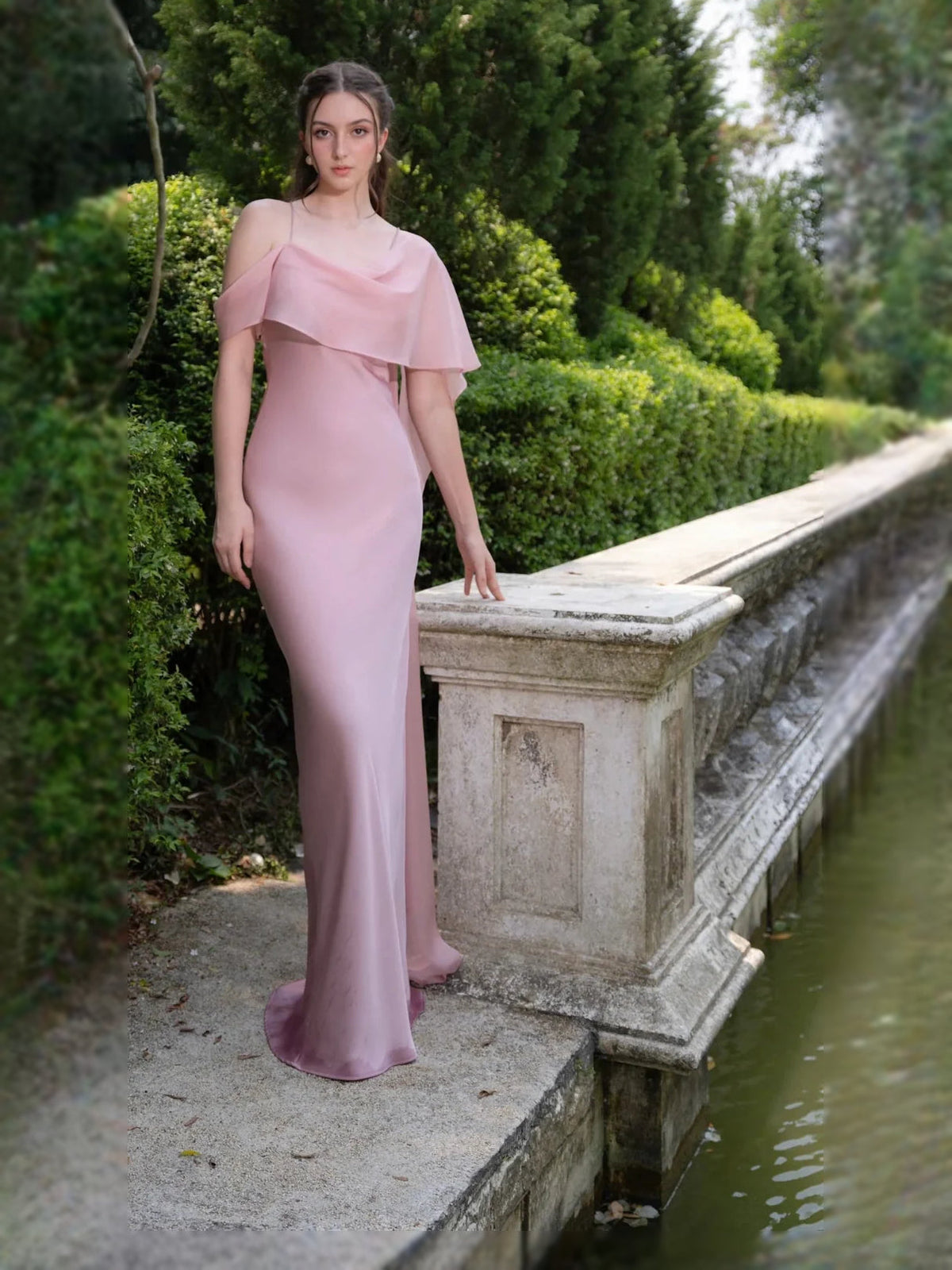 Dusty pink off-shoulder satin mermaid wedding dress with draped shoulder cape