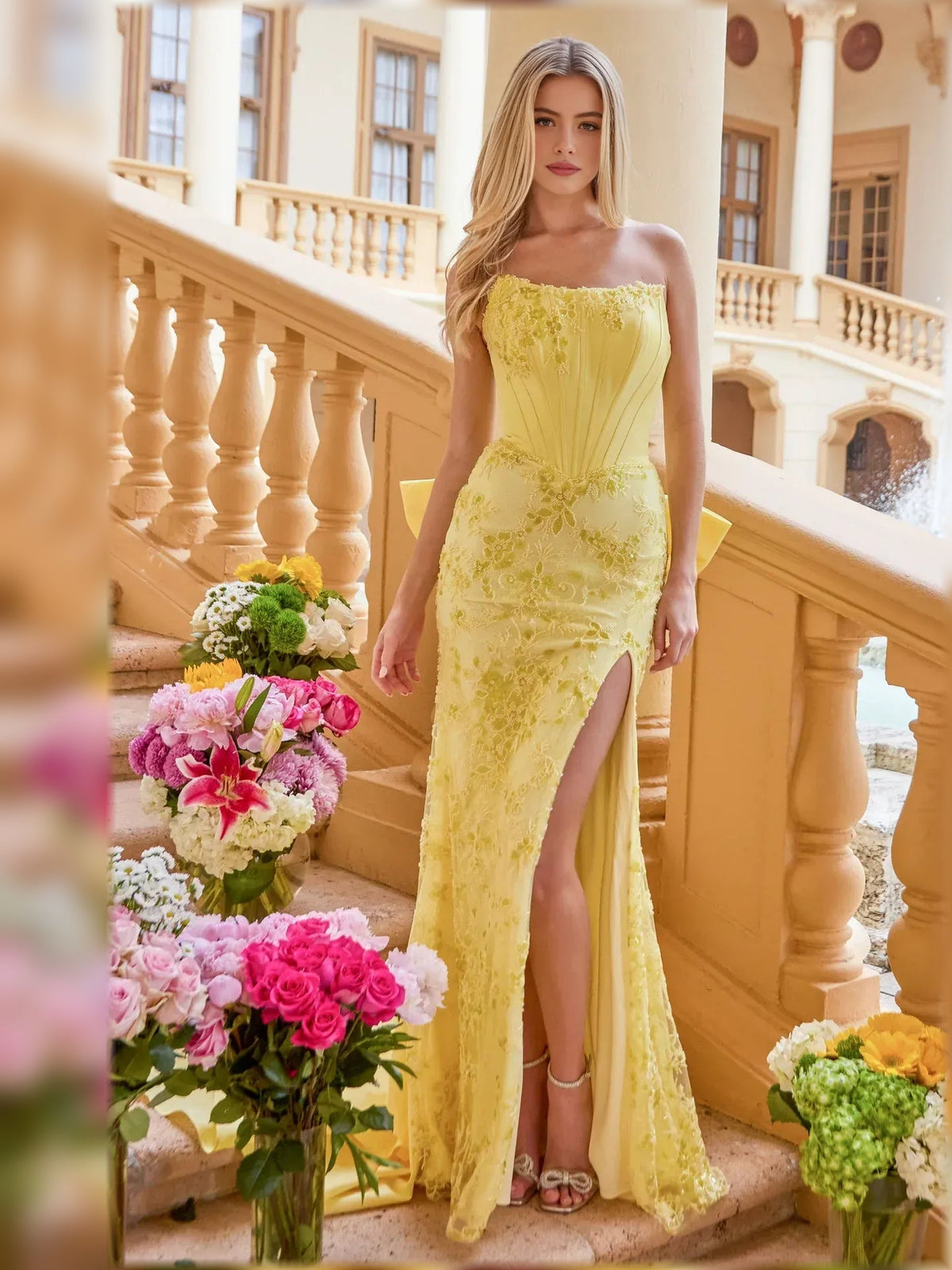 Yellow strapless corset formal gown with lace texture and high slit