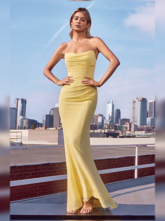 Strapless ruched formal dress in pale yellow, floor-length fitted silhouette