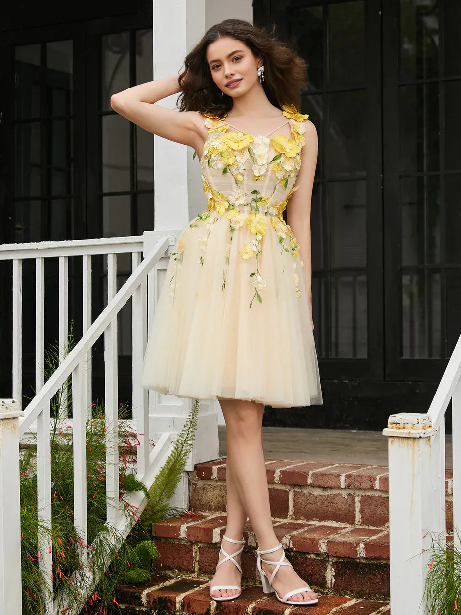 Pale lemon tulle mini dress with square neck, layered flower appliques, and A-line skirt