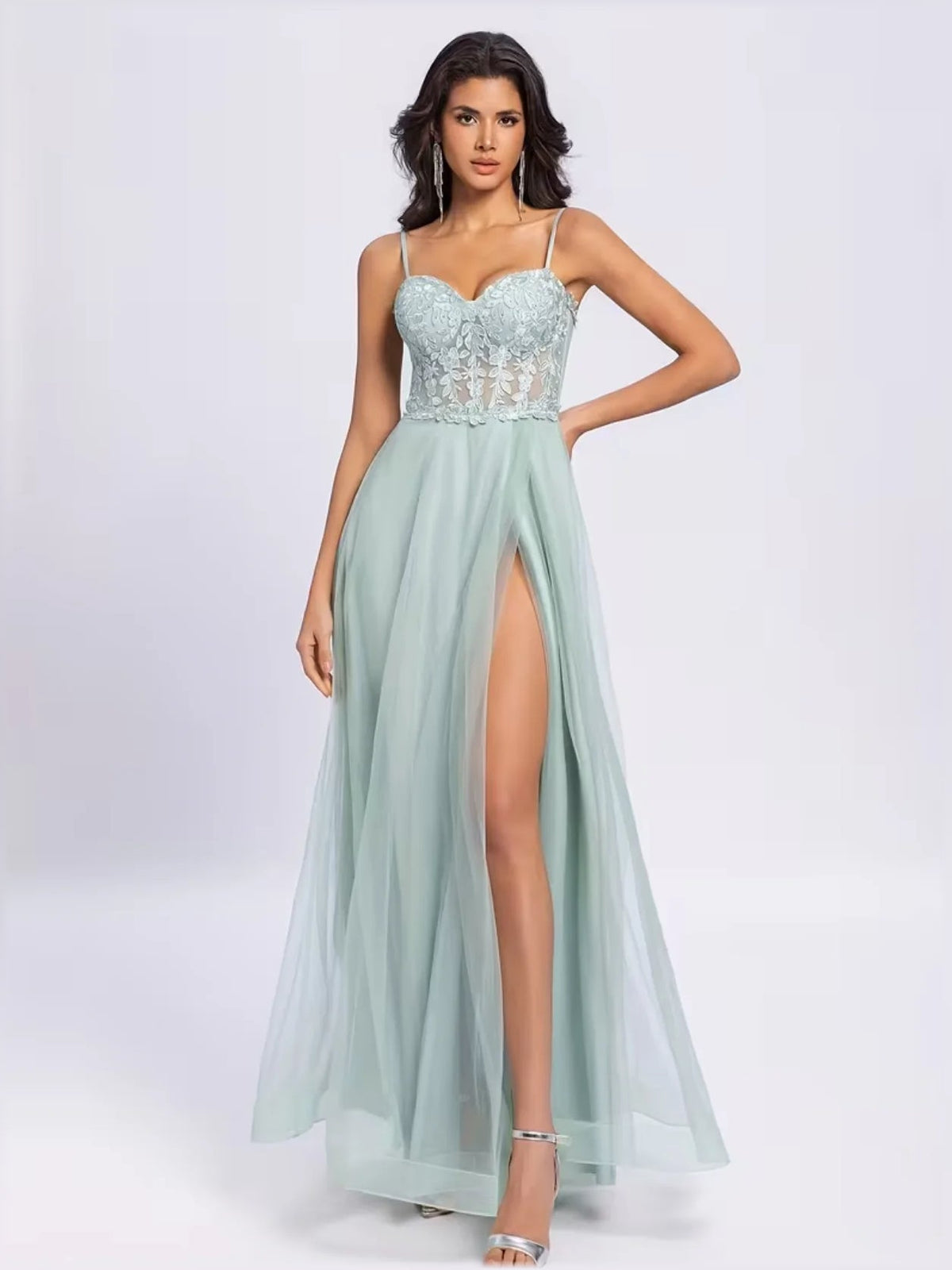 Mint green strapless formal gown with lace bodice, high front slit, and tulle skirt