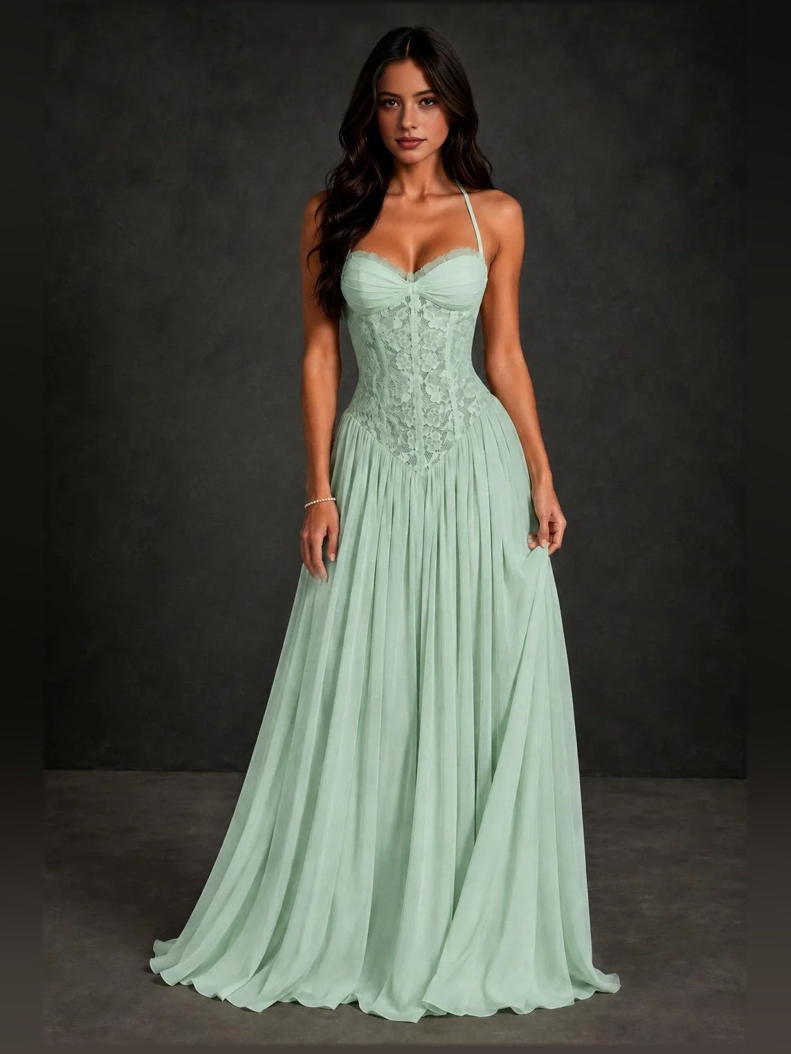 Mint green A-line prom dress with sweetheart neckline, spaghetti straps, pleated skirt.