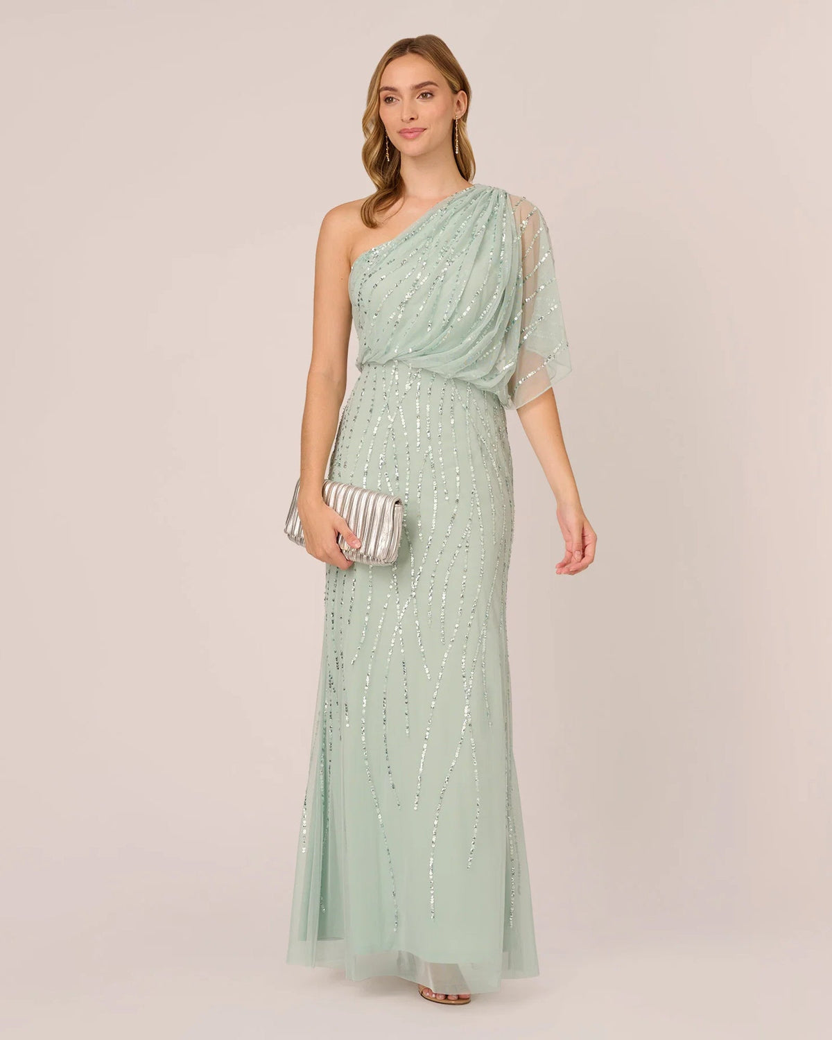 Mint green one-shoulder draped maxi dress with sparkling sequin embellishment and long skirt