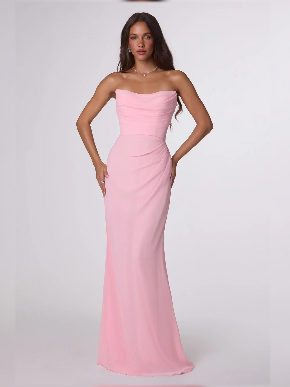 Strapless ruched floor-length formal dress in light pink with fitted column shape