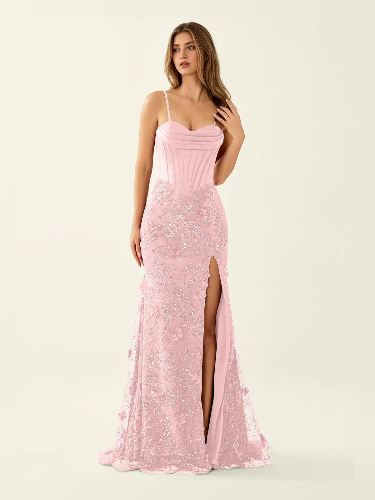 Light pink spaghetti-strap corset-style maxi prom dress with side slit and sequin detail