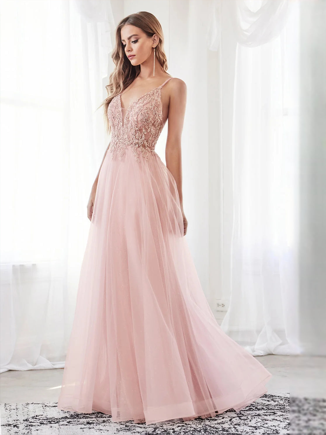 Pink tulle prom dress with draped V-neck bodice and layered A-line floor-length skirt