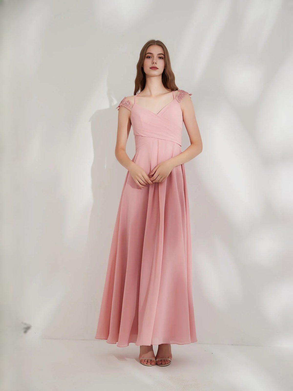 Pink chiffon maxi dress with V-neck ruched waist, cap sleeves, and A-line skirt