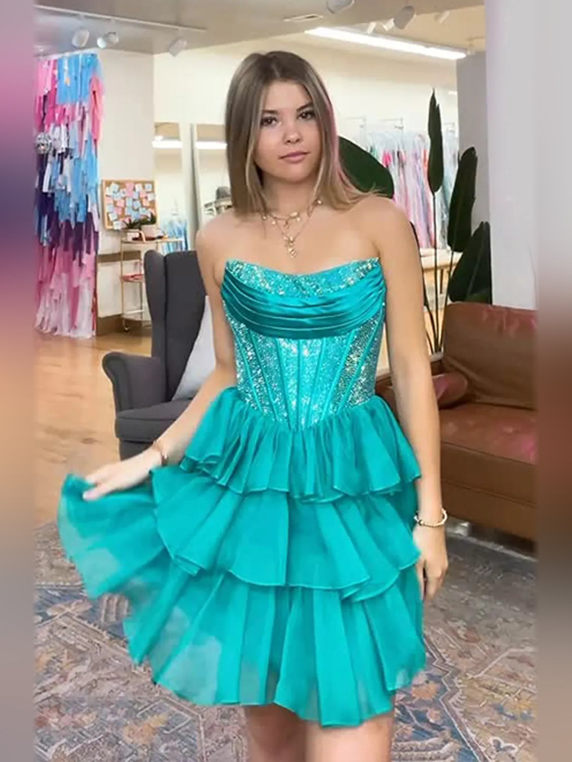 Teal strapless chiffon homecoming dress with glitter bodice and tiered ruffle skirt