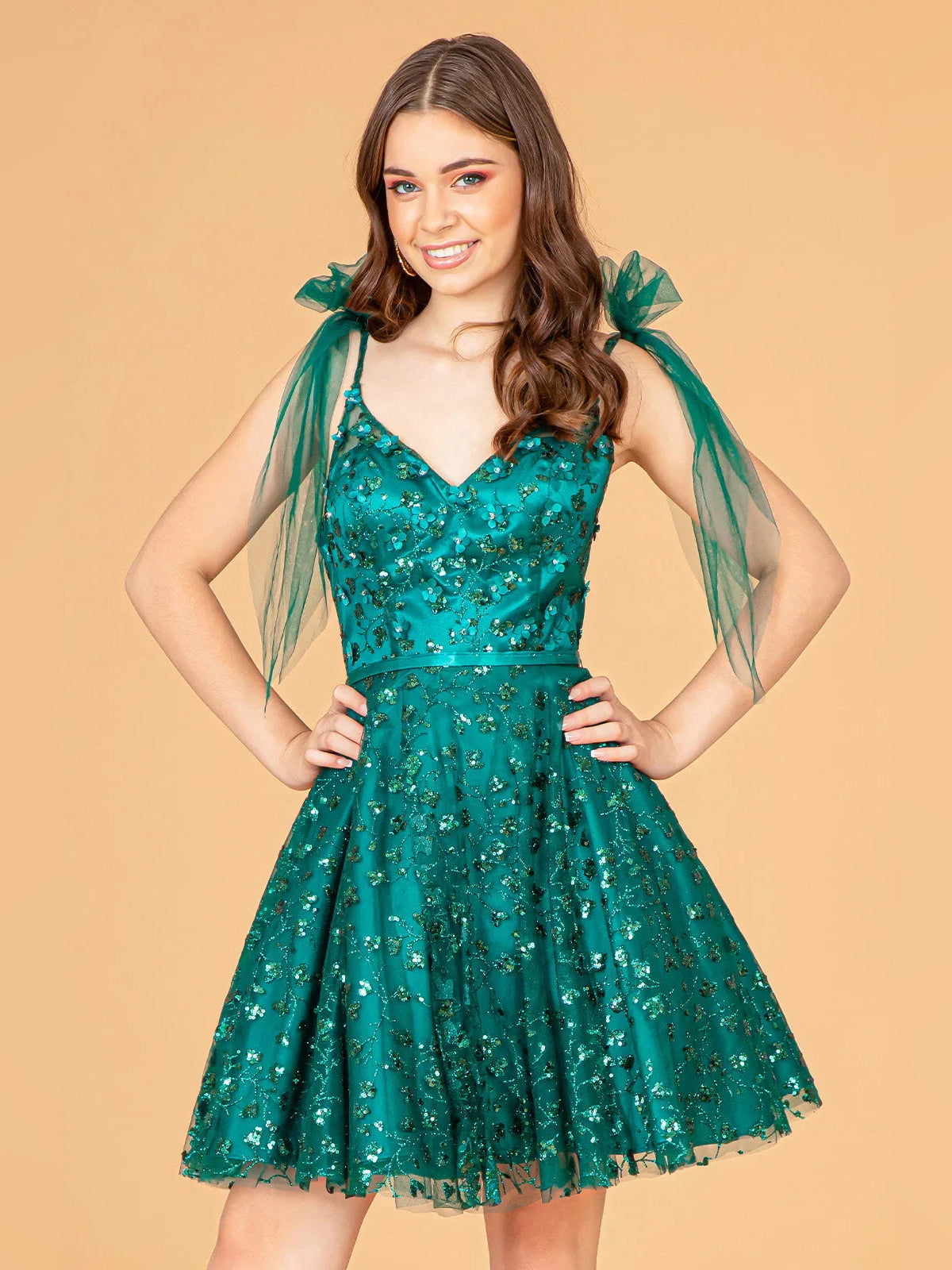 Teal sequined corset-style V-neck mini dress with tulle bow shoulder straps