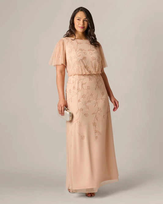 Blush pink maxi A-line dress with flutter sleeves, fitted waist, and floral embroidery