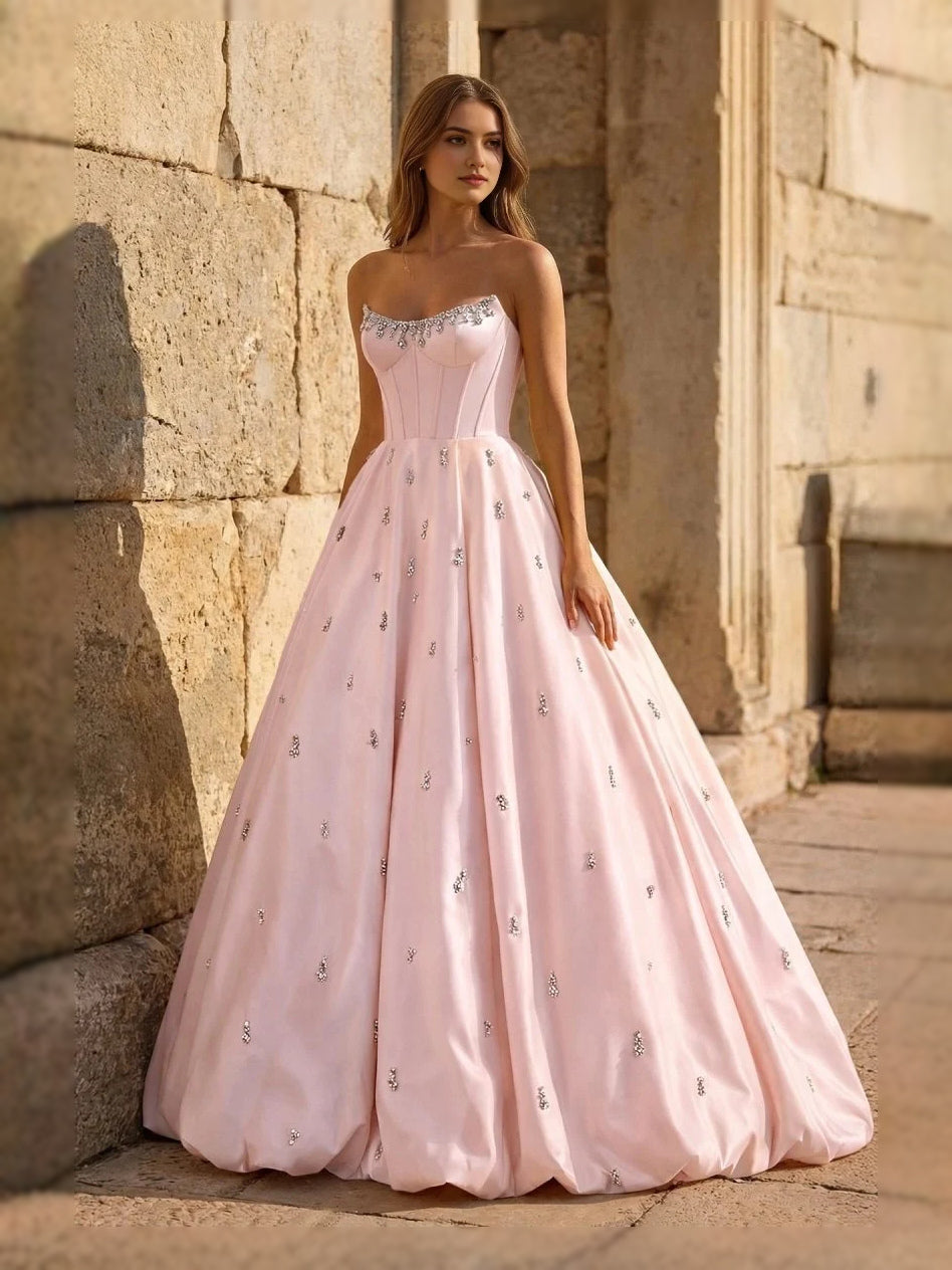 Blush pink sweetheart corset ball gown with tulle skirt and allover sparkle dots