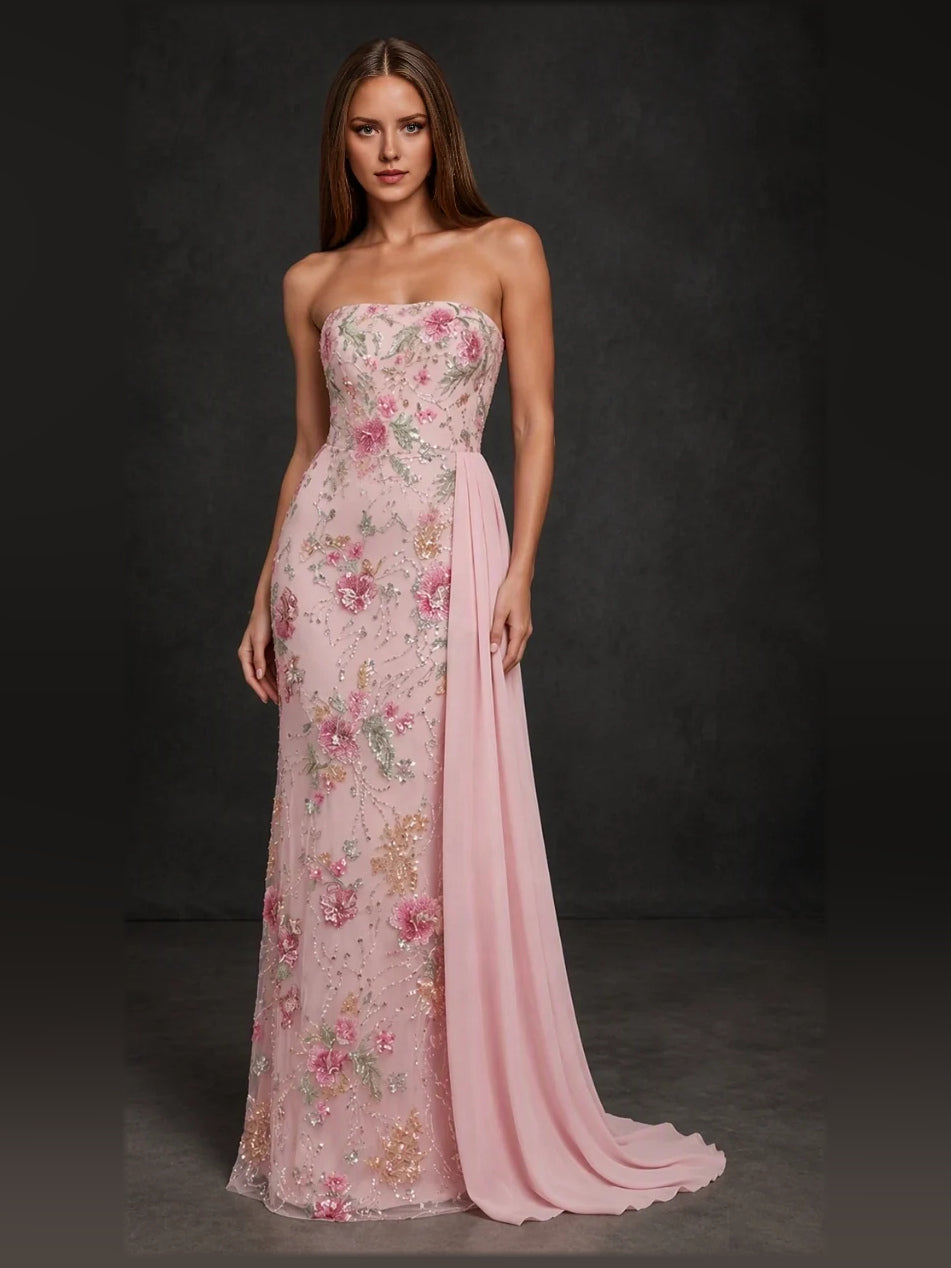 Blush pink strapless mermaid floor-length gown with floral applique and draped skirt