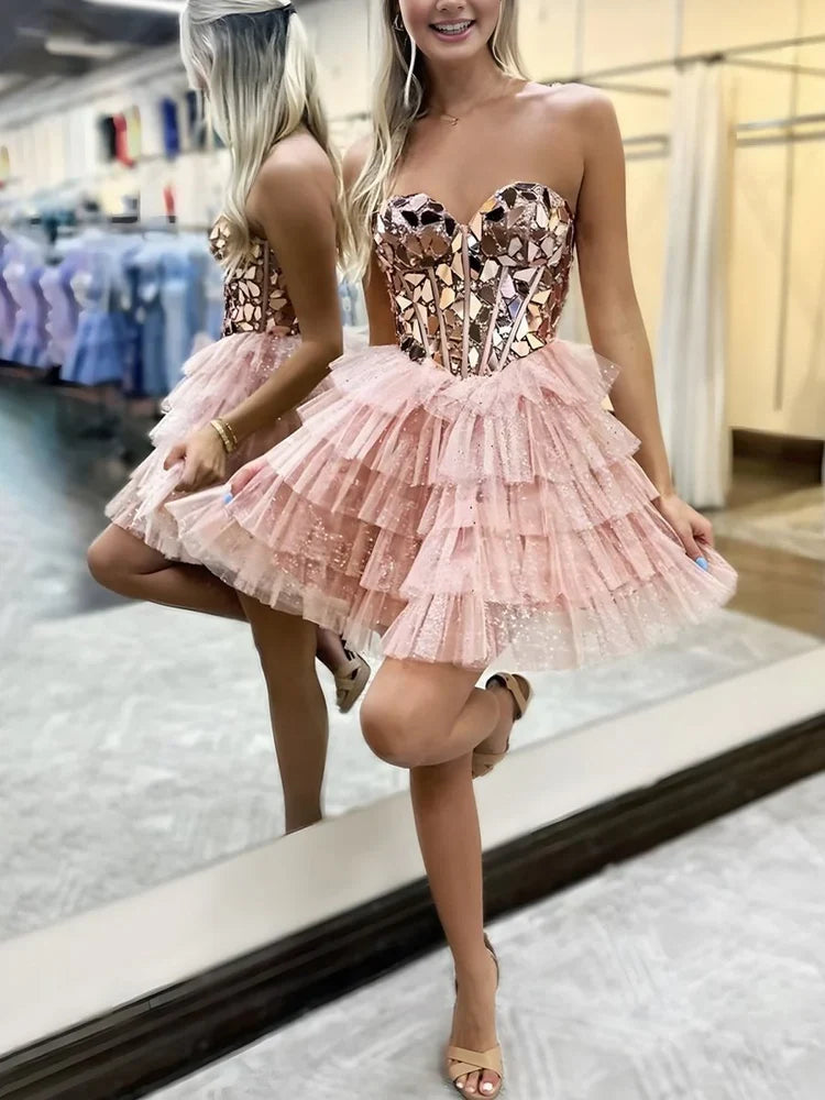Blush pink tiered ruffled tulle mini dress with animal-print sweetheart corset bodice