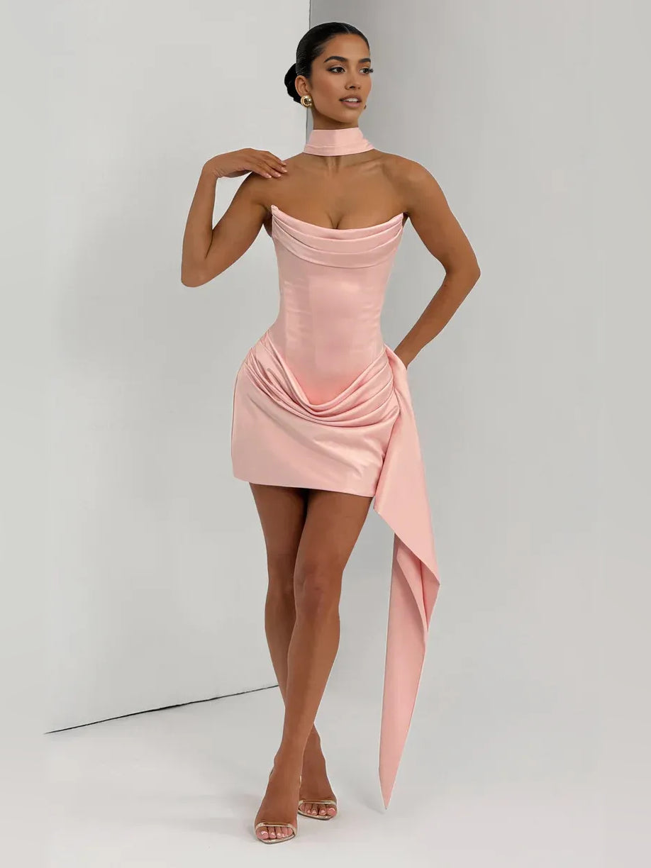 Blush pink satin strapless bodycon mini dress with draped corset bodice and side sash