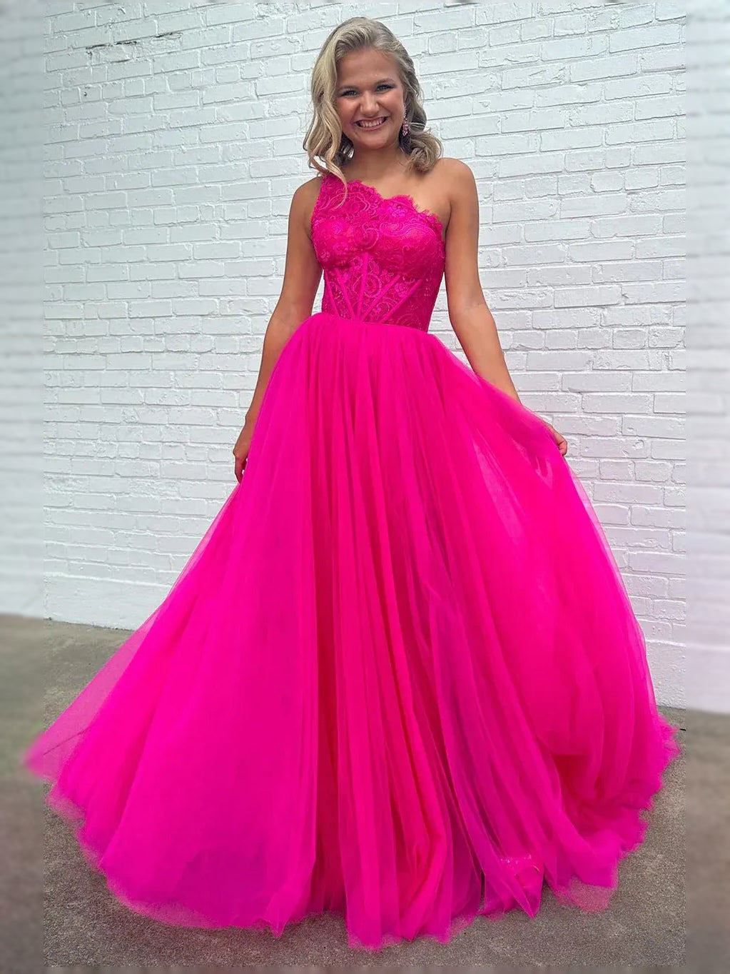 Hot pink sweetheart corset maxi tulle dress with floral lace bodice and full tulle hem