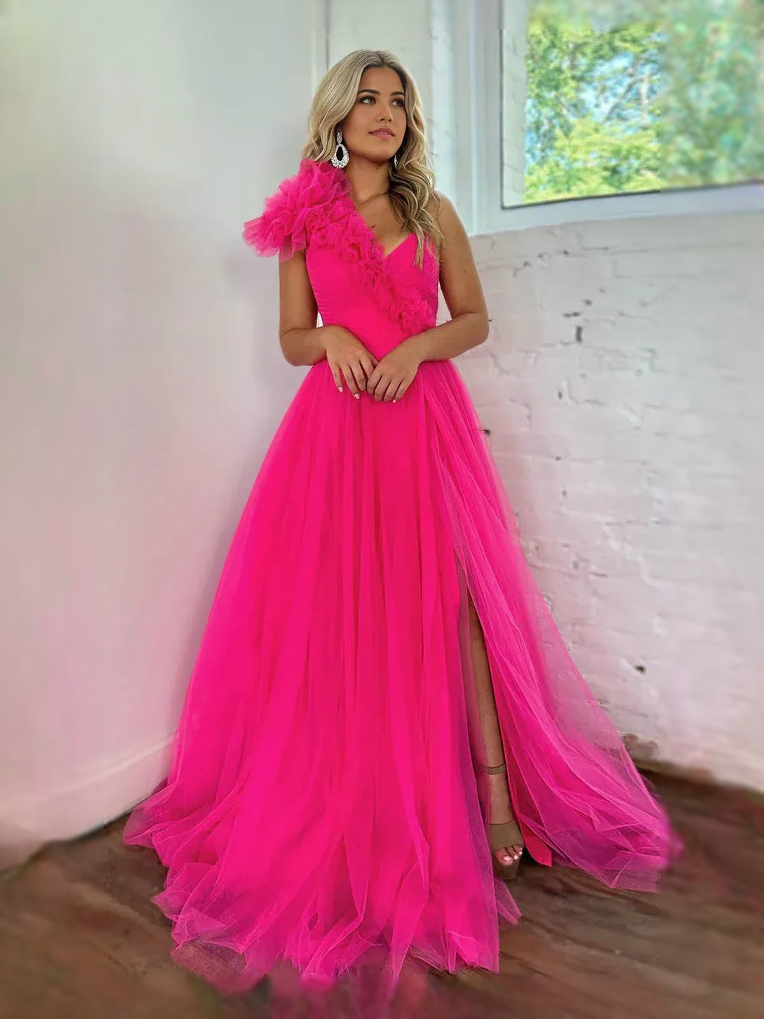 Hot pink V-neck tulle maxi dress with ruffled skirt layers and high side slit
