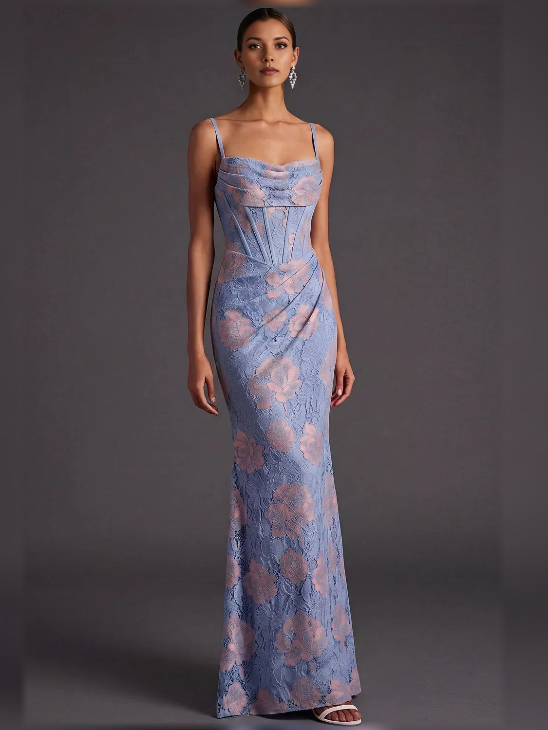 Blue floral formal corset dress with spaghetti straps and ruched bodice, floor-length gown