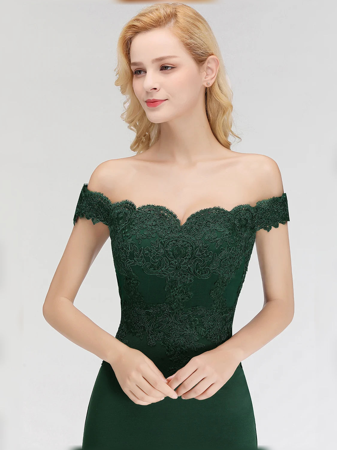 Dark green off-shoulder lace bodice satin mermaid dress with sweetheart neckline close-up