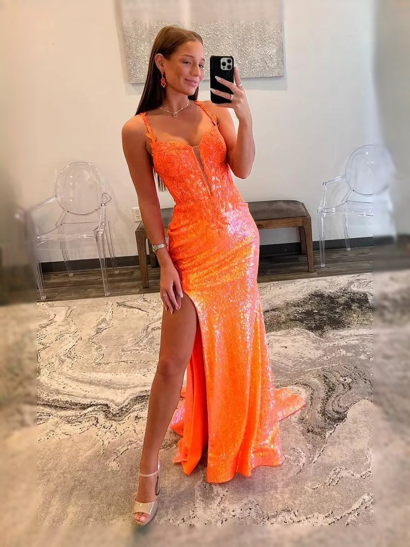 Orange sequin mermaid prom dress with V-neck, side slit, and ruffled tulle hem