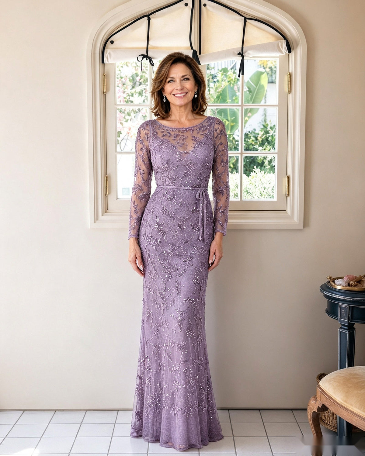 Illusion lace sheath dress in lavender with long sleeves and fitted floor-length silhouette