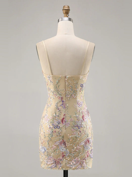 Sequin floral mini dress on mannequin, scoop back and spaghetti straps, fitted bodycon