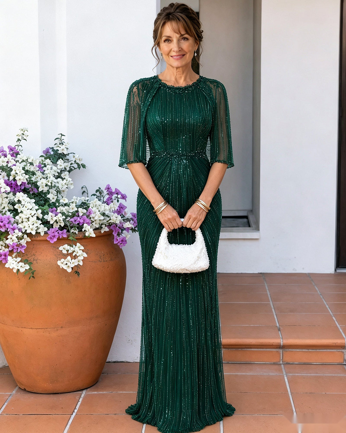 Beaded mother-of-the-bride dress, emerald green with sheer cape sleeves