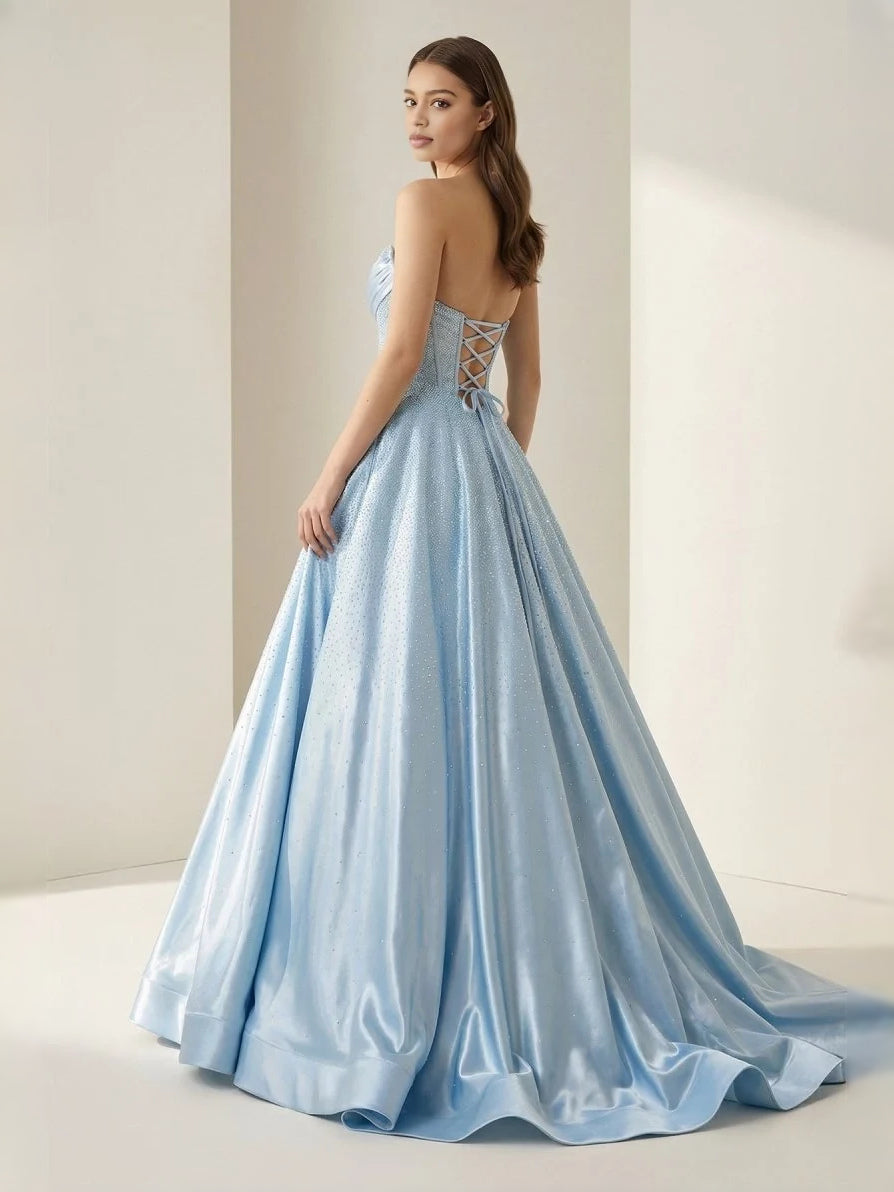 Sky blue strapless corset ballgown with draped bodice and full flowing skirt
