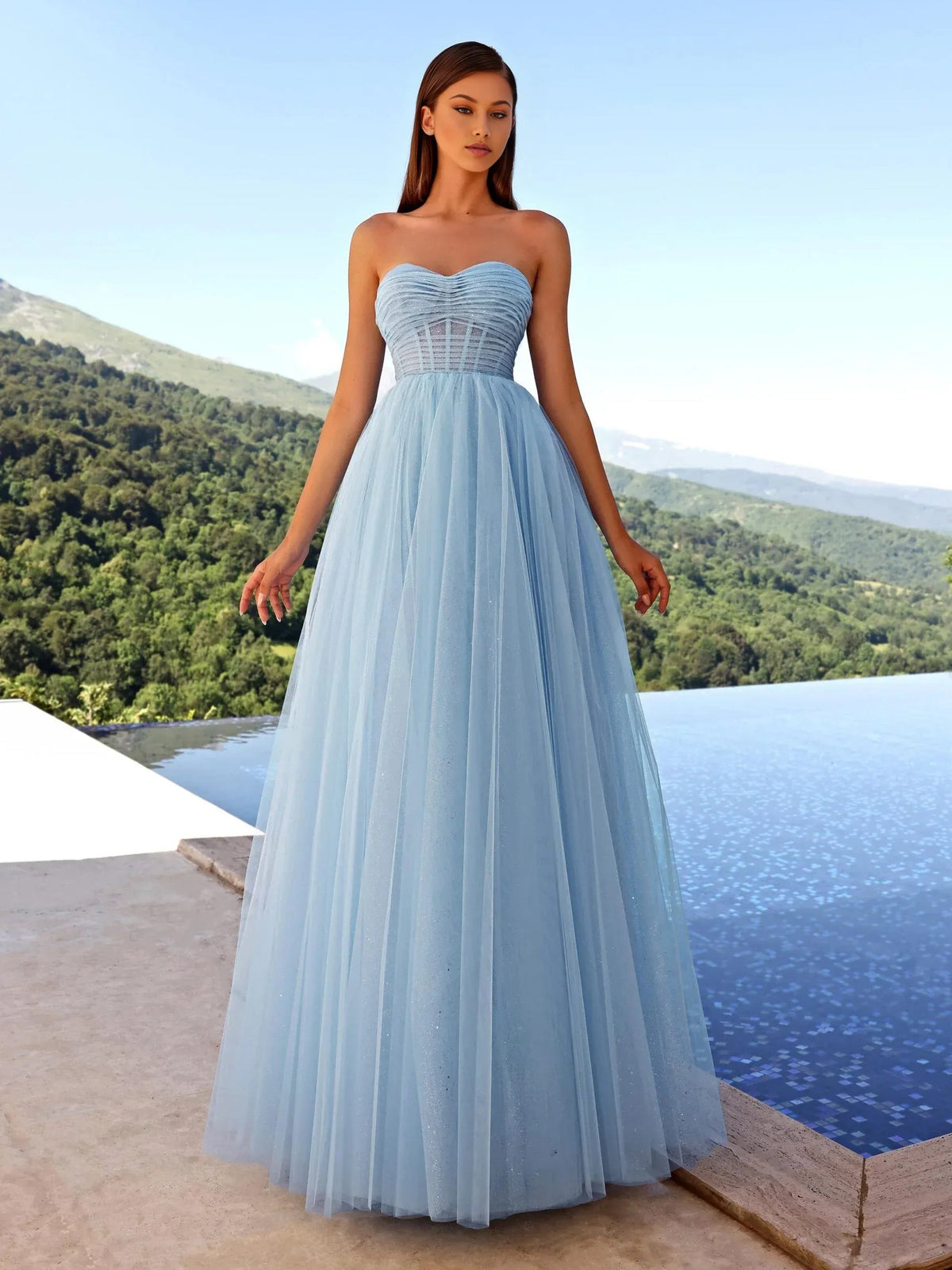Sky blue strapless sweetheart A-line prom dress with ruched bodice and flowing tulle skirt