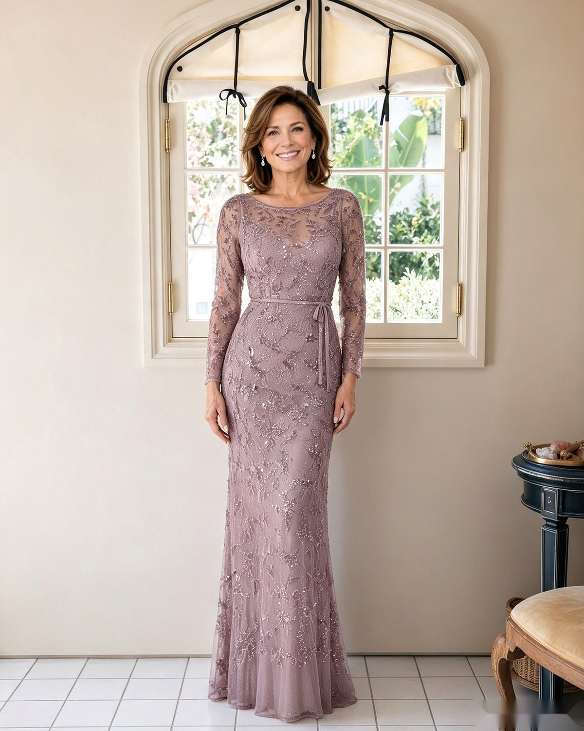 Illusion lace sheath dress in dusty mauve with long sleeves and fitted floor-length silhouette