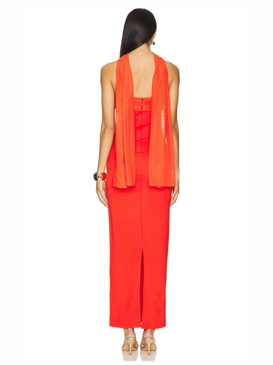 Red strapless sheath maxi dress with draped sheer cape over the back