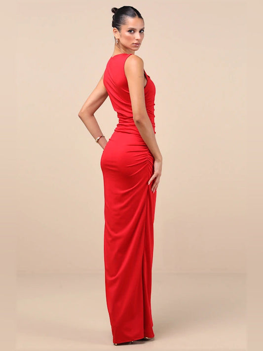 Red one-shoulder ruched maxi formal dress with slit, standing side pose
